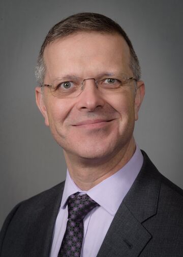 head shot of Oleg Rivkin, PA, MBA